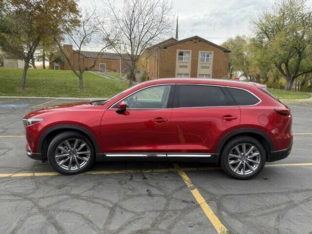 Червоний Мазда СХ-9, об'ємом двигуна 2.5 л та пробігом 28 тис. км за 5600 $, фото 6 на Automoto.ua