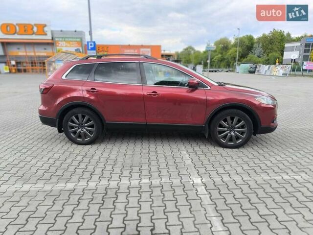 Красный Мазда СХ-9, объемом двигателя 3.73 л и пробегом 140 тыс. км за 12500 $, фото 1 на Automoto.ua