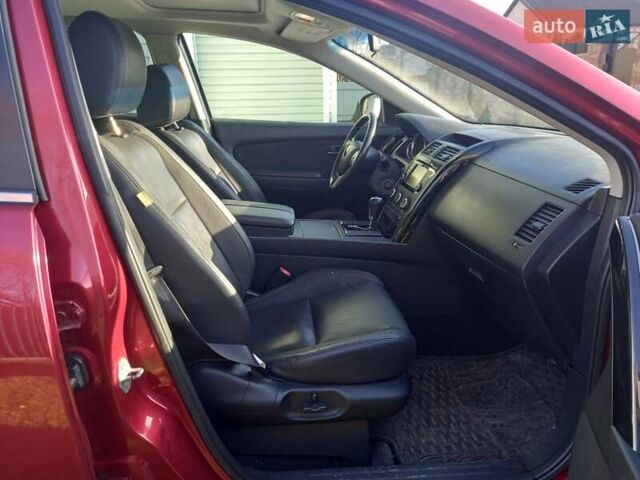 Красный Мазда СХ-9, объемом двигателя 3.7 л и пробегом 129 тыс. км за 12500 $, фото 1 на Automoto.ua