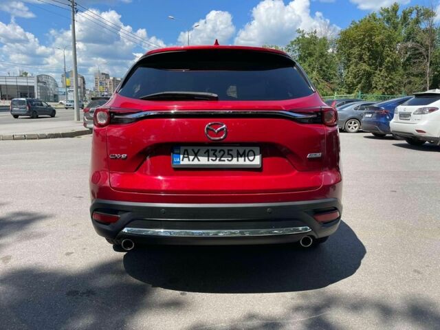 Красный Мазда СХ-9, объемом двигателя 2.5 л и пробегом 164 тыс. км за 18500 $, фото 4 на Automoto.ua