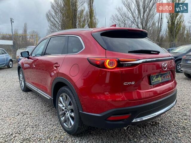 Красный Мазда СХ-9, объемом двигателя 2.49 л и пробегом 95 тыс. км за 23700 $, фото 4 на Automoto.ua