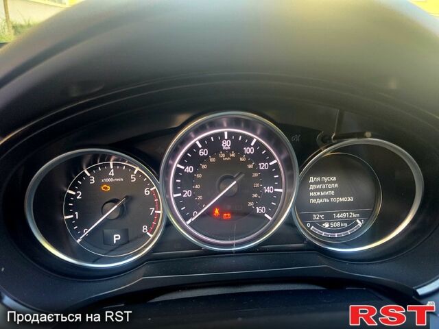 Красный Мазда СХ-9, объемом двигателя 2.5 л и пробегом 144 тыс. км за 22000 $, фото 5 на Automoto.ua