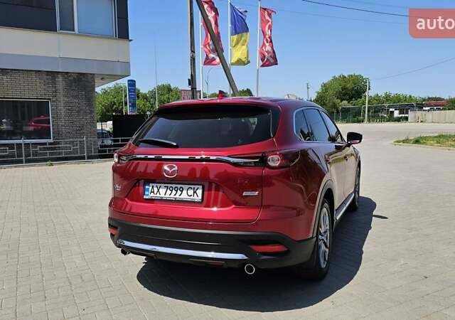 Красный Мазда СХ-9, объемом двигателя 2.5 л и пробегом 124 тыс. км за 27200 $, фото 11 на Automoto.ua