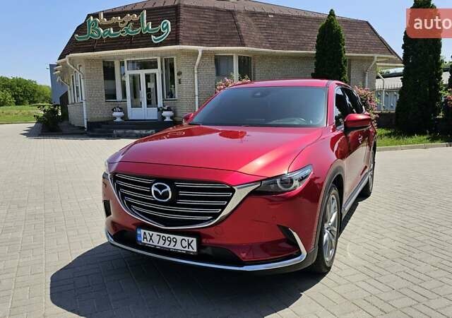 Красный Мазда СХ-9, объемом двигателя 2.5 л и пробегом 124 тыс. км за 27200 $, фото 1 на Automoto.ua