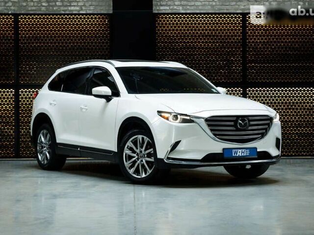 Мазда СХ-9, объемом двигателя 2.5 л и пробегом 98 тыс. км за 25000 $, фото 3 на Automoto.ua