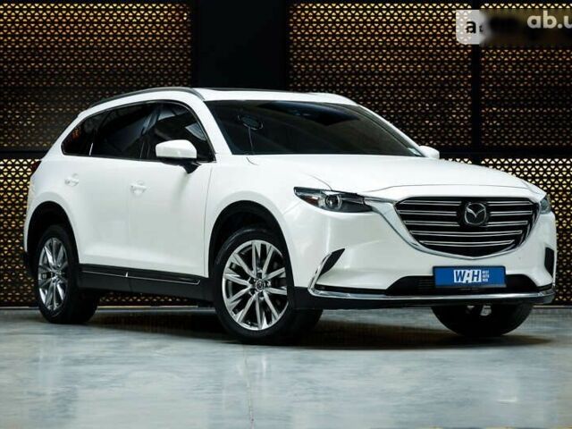 Мазда СХ-9, объемом двигателя 2.5 л и пробегом 98 тыс. км за 25000 $, фото 4 на Automoto.ua