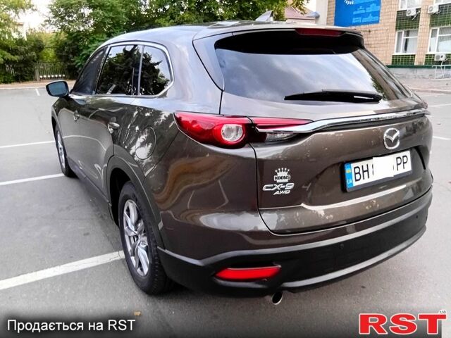 Мазда СХ-9, объемом двигателя 2.5 л и пробегом 146 тыс. км за 21700 $, фото 4 на Automoto.ua
