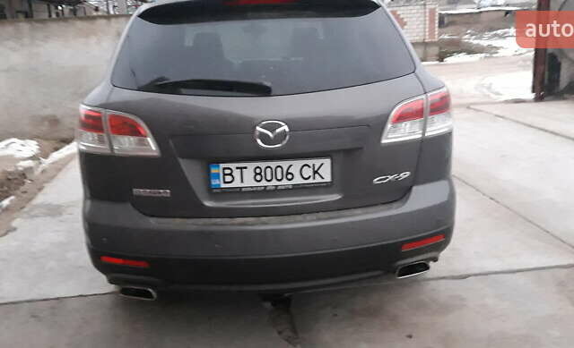 Серый Мазда СХ-9, объемом двигателя 3.7 л и пробегом 182 тыс. км за 9500 $, фото 1 на Automoto.ua