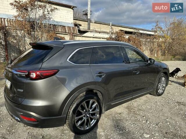 Серый Мазда СХ-9, объемом двигателя 2.49 л и пробегом 143 тыс. км за 22500 $, фото 4 на Automoto.ua