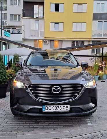 Серый Мазда СХ-9, объемом двигателя 2.49 л и пробегом 172 тыс. км за 24000 $, фото 1 на Automoto.ua