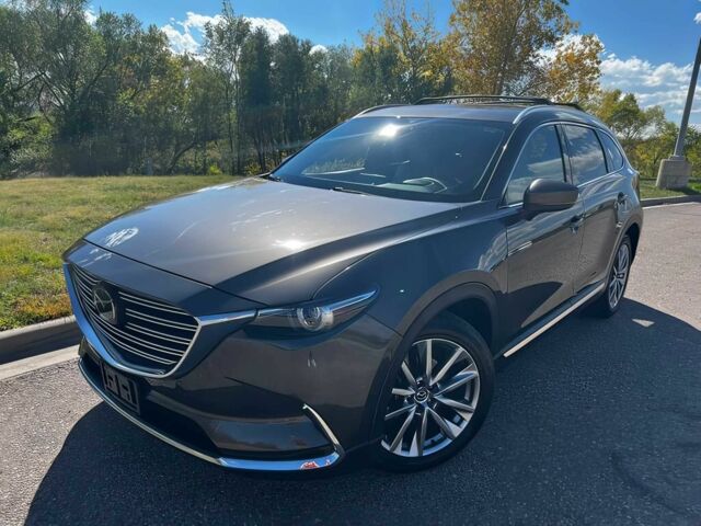 Серый Мазда СХ-9, объемом двигателя 2.5 л и пробегом 67 тыс. км за 11000 $, фото 1 на Automoto.ua