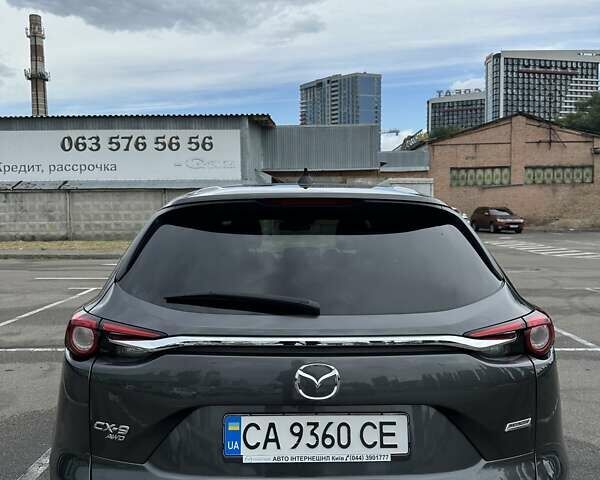 Серый Мазда СХ-9, объемом двигателя 2.49 л и пробегом 169 тыс. км за 23000 $, фото 4 на Automoto.ua