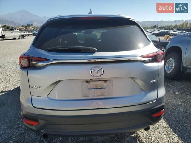 Серый Мазда СХ-9, объемом двигателя 2.49 л и пробегом 103 тыс. км за 5500 $, фото 5 на Automoto.ua