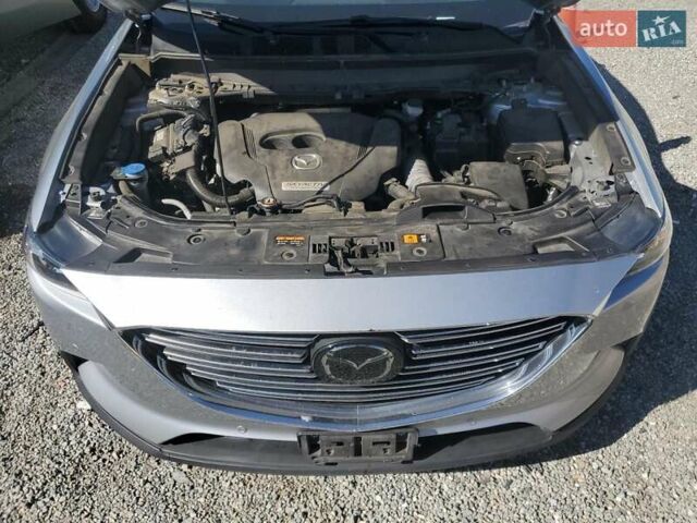 Серый Мазда СХ-9, объемом двигателя 2.49 л и пробегом 103 тыс. км за 5500 $, фото 11 на Automoto.ua