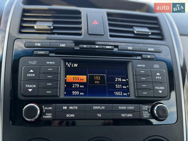 Синий Мазда СХ-9, объемом двигателя 3.7 л и пробегом 223 тыс. км за 12800 $, фото 58 на Automoto.ua