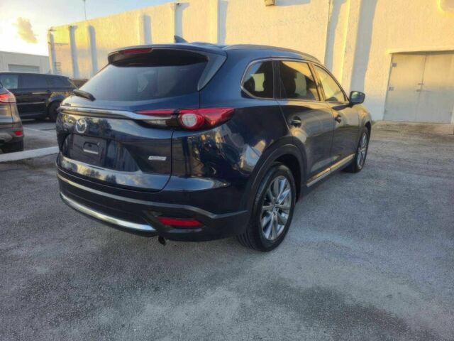 Синий Мазда СХ-9, объемом двигателя 2.5 л и пробегом 35 тыс. км за 9500 $, фото 7 на Automoto.ua