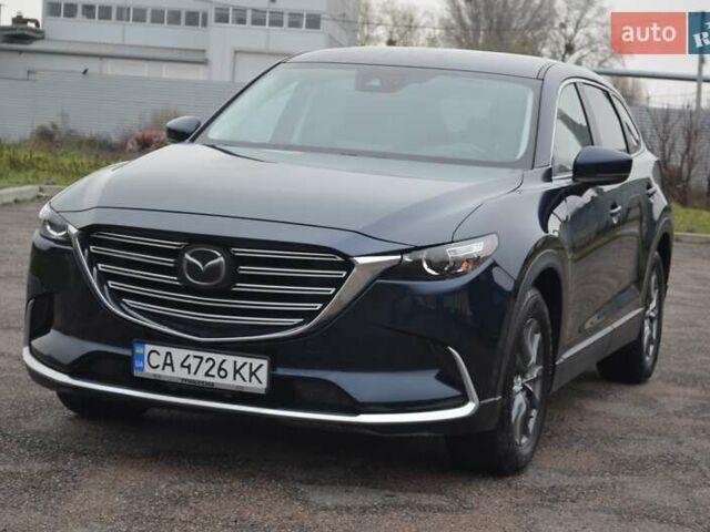 Синий Мазда СХ-9, объемом двигателя 2.49 л и пробегом 49 тыс. км за 19900 $, фото 2 на Automoto.ua