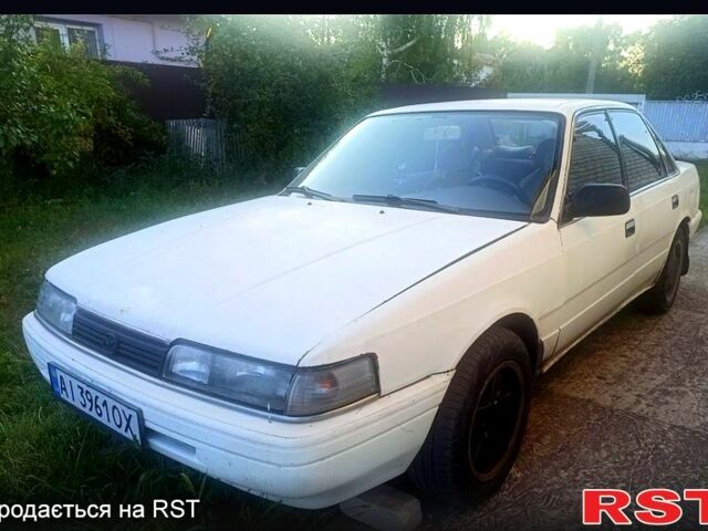 Белый Мазда Капелла, объемом двигателя 1.8 л и пробегом 520 тыс. км за 700 $, фото 2 на Automoto.ua