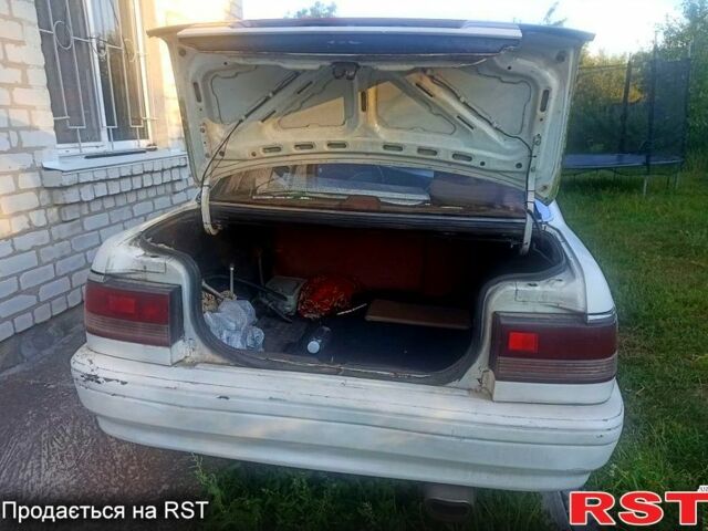 Белый Мазда Капелла, объемом двигателя 1.8 л и пробегом 520 тыс. км за 700 $, фото 4 на Automoto.ua