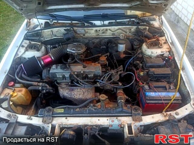 Белый Мазда Капелла, объемом двигателя 1.8 л и пробегом 520 тыс. км за 700 $, фото 3 на Automoto.ua