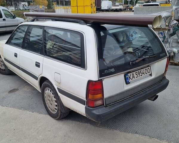 Белый Мазда Капелла, объемом двигателя 1.6 л и пробегом 154 тыс. км за 3000 $, фото 7 на Automoto.ua