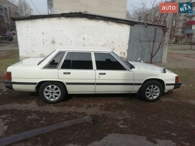 Белый Мазда Космо, объемом двигателя 2 л и пробегом 100 тыс. км за 2500 $, фото 5 на Automoto.ua
