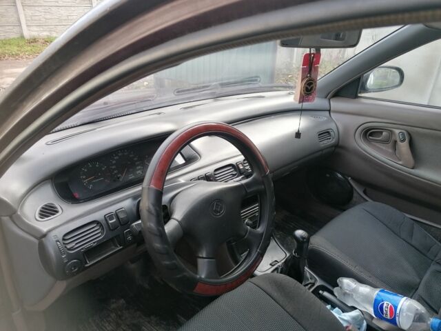 Фиолетовый Мазда Кронос, объемом двигателя 2 л и пробегом 250 тыс. км за 1700 $, фото 3 на Automoto.ua