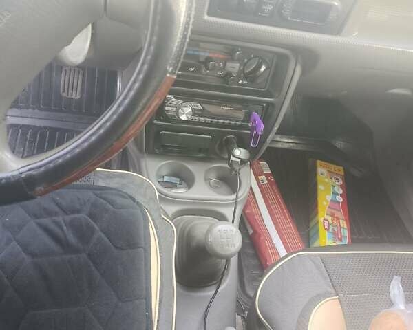 Чорний Мазда Деміо, об'ємом двигуна 1.3 л та пробігом 40 тис. км за 2600 $, фото 5 на Automoto.ua