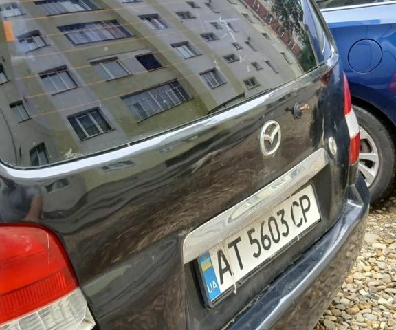 Черный Мазда Демио, объемом двигателя 1.5 л и пробегом 280 тыс. км за 2500 $, фото 2 на Automoto.ua