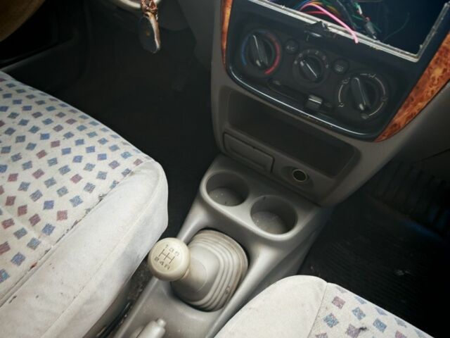 Черный Мазда Демио, объемом двигателя 1.5 л и пробегом 280 тыс. км за 2500 $, фото 6 на Automoto.ua