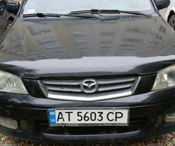 Черный Мазда Демио, объемом двигателя 1.5 л и пробегом 280 тыс. км за 2500 $, фото 3 на Automoto.ua