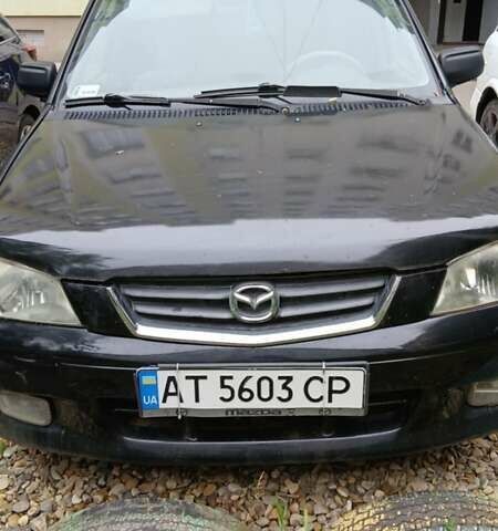 Черный Мазда Демио, объемом двигателя 1.5 л и пробегом 280 тыс. км за 2500 $, фото 1 на Automoto.ua