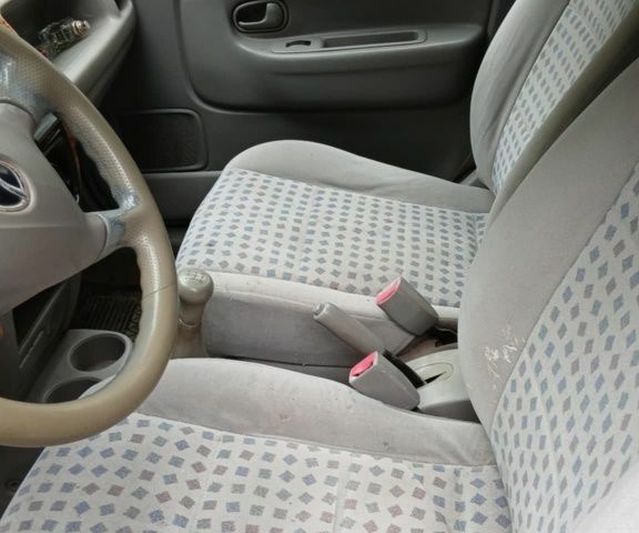 Черный Мазда Демио, объемом двигателя 1.5 л и пробегом 280 тыс. км за 2500 $, фото 4 на Automoto.ua