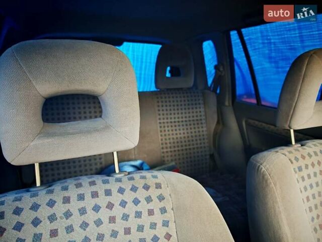 Черный Мазда Демио, объемом двигателя 1.5 л и пробегом 280 тыс. км за 2500 $, фото 5 на Automoto.ua