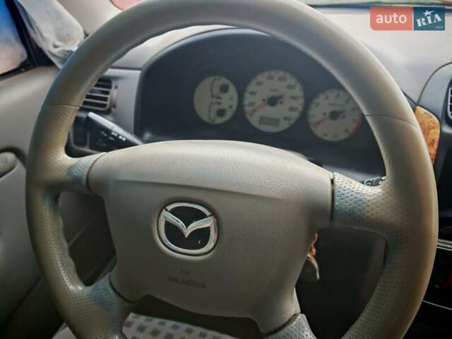 Черный Мазда Демио, объемом двигателя 1.5 л и пробегом 280 тыс. км за 2500 $, фото 7 на Automoto.ua