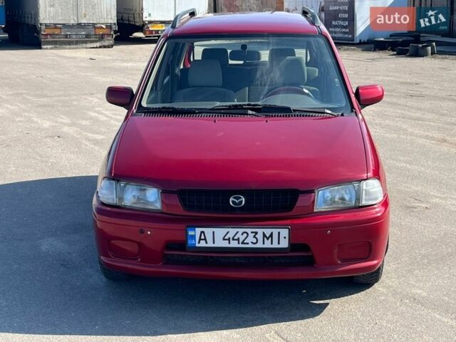 Червоний Мазда Деміо, об'ємом двигуна 1.4 л та пробігом 471 тис. км за 2600 $, фото 2 на Automoto.ua