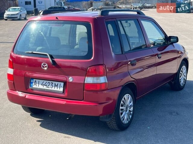 Червоний Мазда Деміо, об'ємом двигуна 1.4 л та пробігом 471 тис. км за 2600 $, фото 8 на Automoto.ua