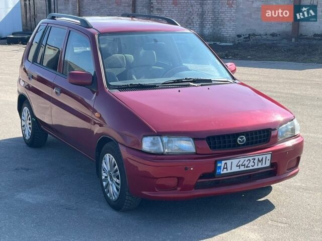 Червоний Мазда Деміо, об'ємом двигуна 1.4 л та пробігом 471 тис. км за 2600 $, фото 3 на Automoto.ua