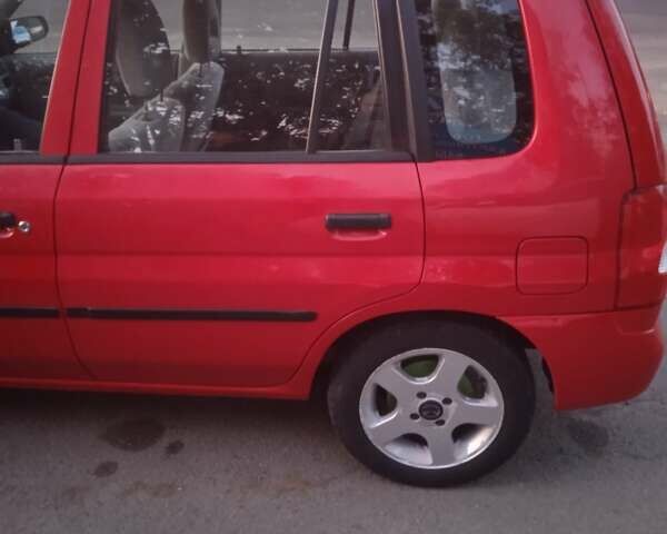 Красный Мазда Демио, объемом двигателя 1.5 л и пробегом 197 тыс. км за 3300 $, фото 8 на Automoto.ua