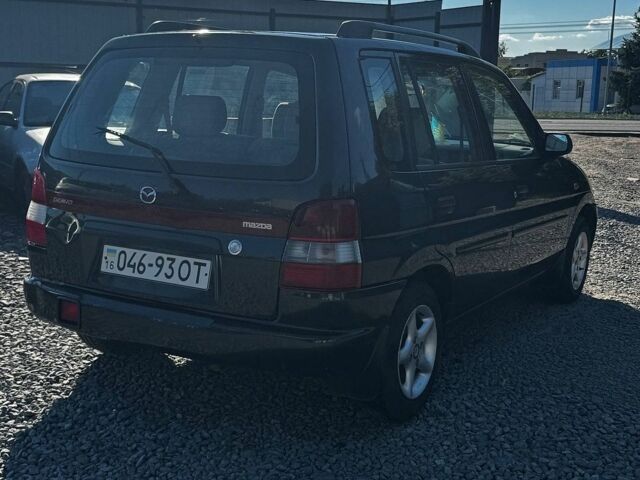 Мазда Демио, объемом двигателя 1.3 л и пробегом 155 тыс. км за 1999 $, фото 5 на Automoto.ua