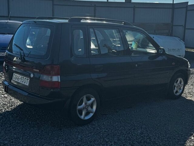 Мазда Демио, объемом двигателя 1.3 л и пробегом 155 тыс. км за 1999 $, фото 6 на Automoto.ua