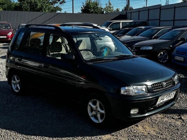 Мазда Демио, объемом двигателя 1.3 л и пробегом 155 тыс. км за 1999 $, фото 4 на Automoto.ua
