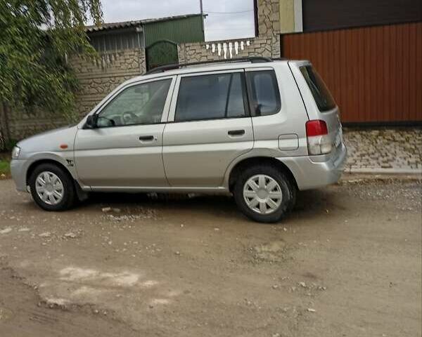 Сірий Мазда Деміо, об'ємом двигуна 1.32 л та пробігом 218 тис. км за 2500 $, фото 2 на Automoto.ua