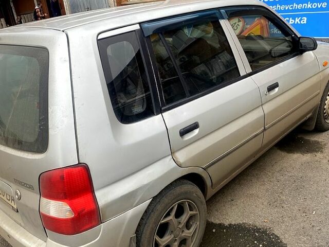 Сірий Мазда Деміо, об'ємом двигуна 1.3 л та пробігом 444 тис. км за 1400 $, фото 3 на Automoto.ua