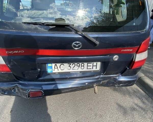 Синій Мазда Деміо, об'ємом двигуна 1.3 л та пробігом 112 тис. км за 700 $, фото 5 на Automoto.ua