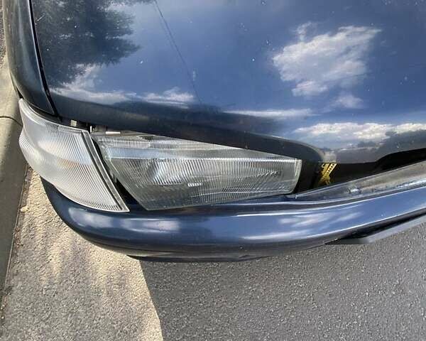 Синій Мазда Деміо, об'ємом двигуна 1.3 л та пробігом 112 тис. км за 700 $, фото 2 на Automoto.ua