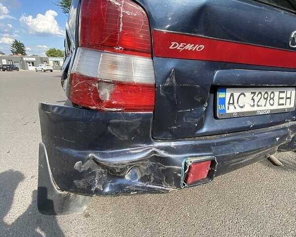 Синій Мазда Деміо, об'ємом двигуна 1.3 л та пробігом 112 тис. км за 700 $, фото 3 на Automoto.ua