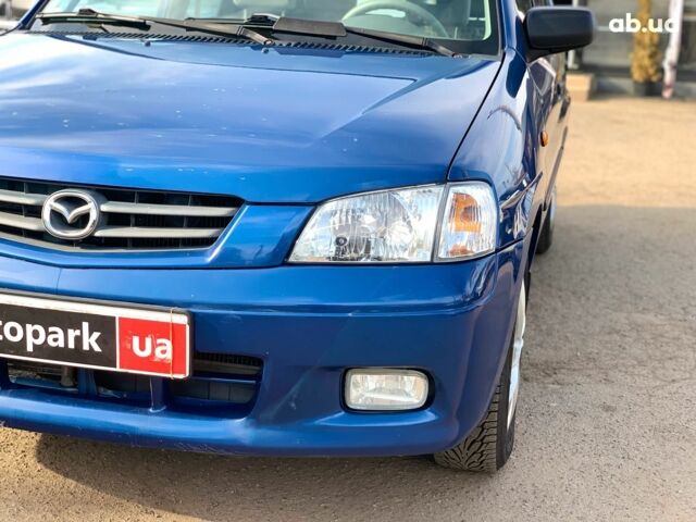 Синій Мазда Деміо, об'ємом двигуна 1.5 л та пробігом 73 тис. км за 4190 $, фото 8 на Automoto.ua