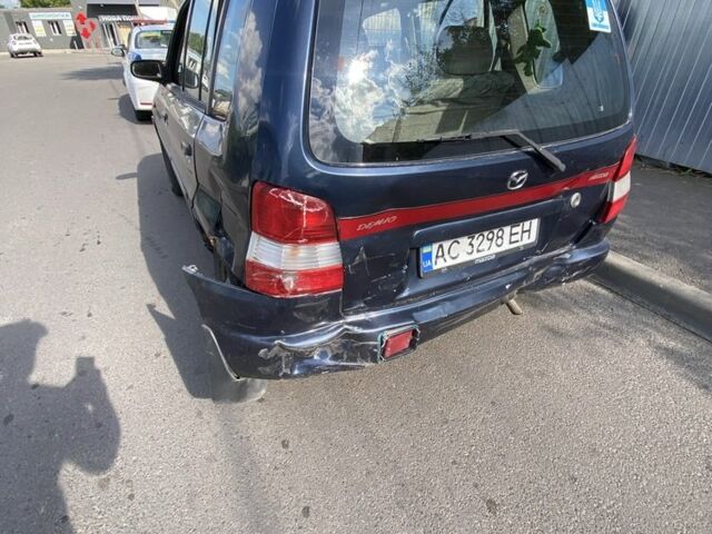 Синій Мазда Деміо, об'ємом двигуна 1.3 л та пробігом 112 тис. км за 700 $, фото 1 на Automoto.ua