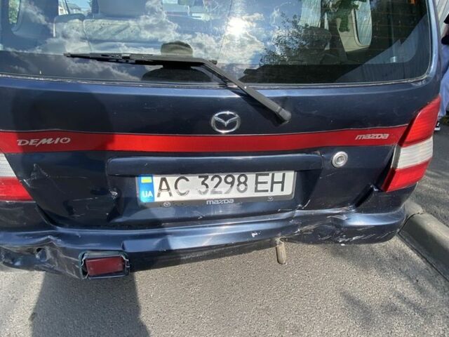 Синій Мазда Деміо, об'ємом двигуна 1.3 л та пробігом 112 тис. км за 700 $, фото 6 на Automoto.ua
